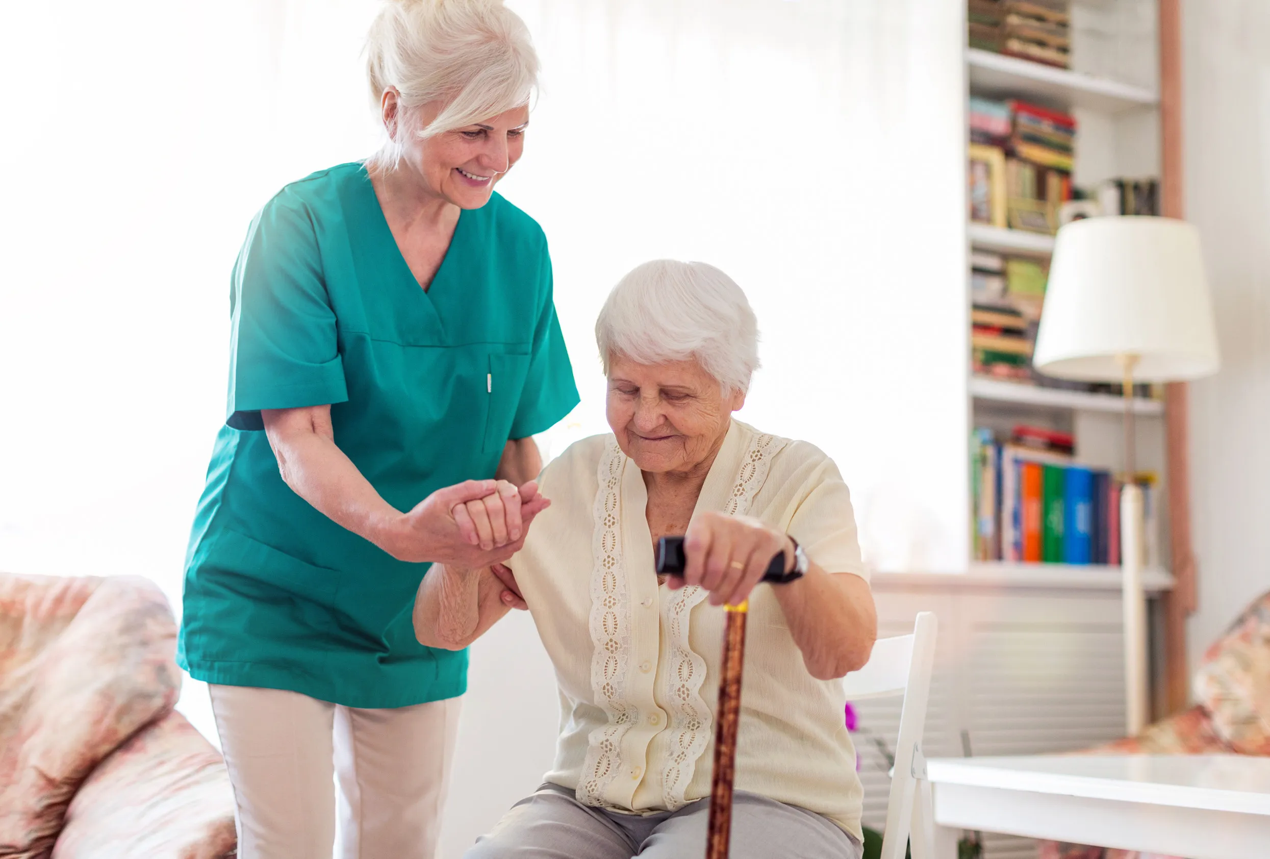 Senior woman with her female caregiver
